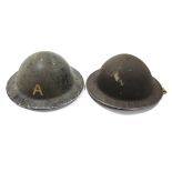 Two steel safety helmets.