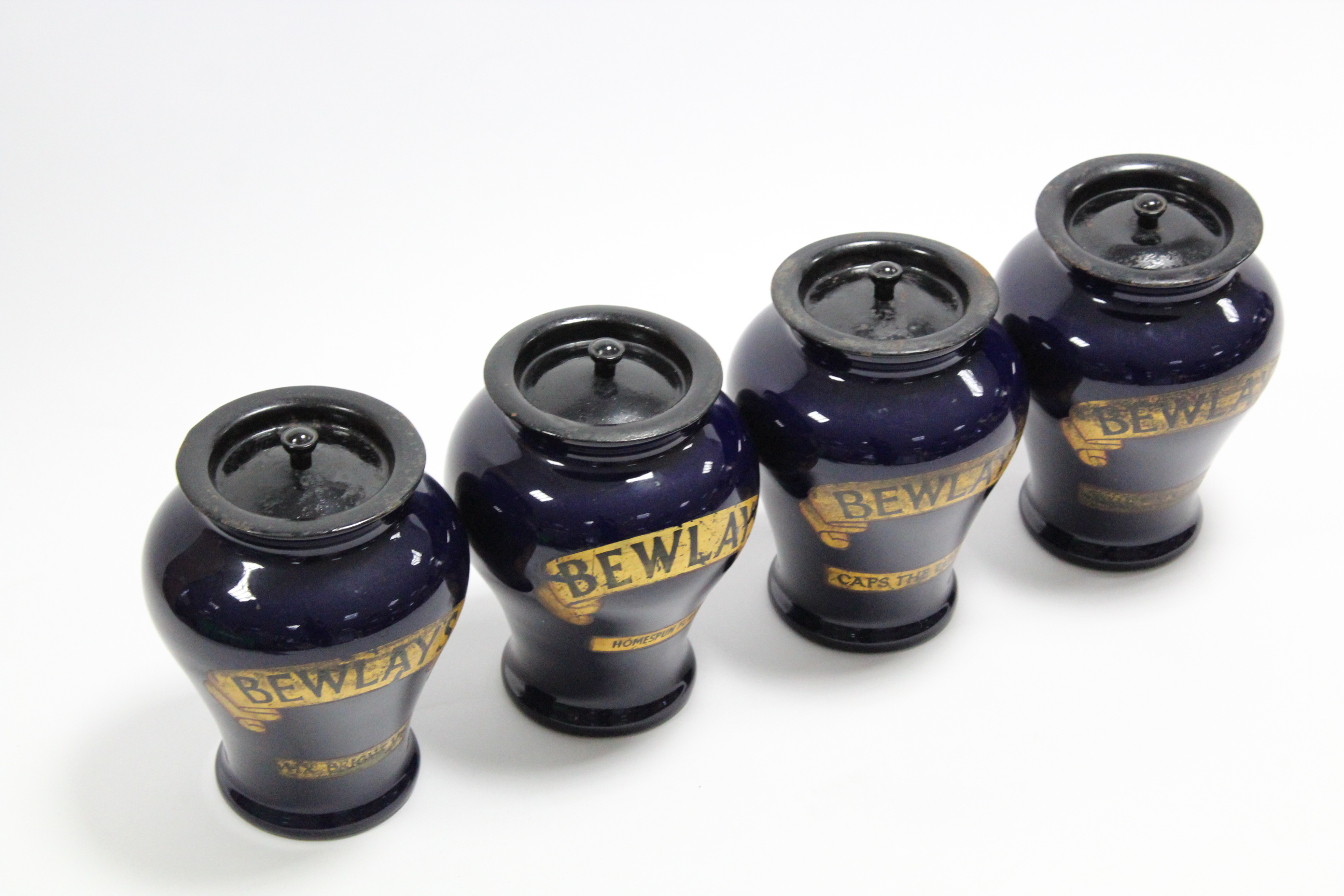 A set of four early 20th century Royal Doulton blue glazed stoneware “BEWLAYS” tobacco jars, 8½” - Image 2 of 3