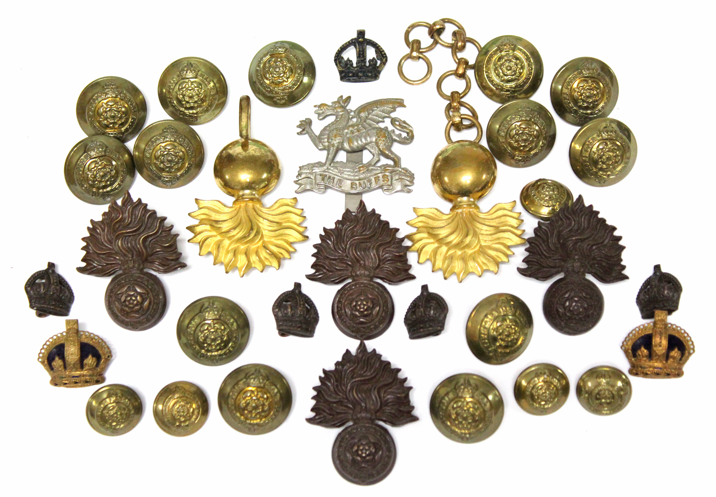 Seven various British military cap badges; & various ditto tunic buttons.