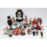 Nine various mid-20th century costume dolls; & a 1990’s Heritage Mint costume doll.