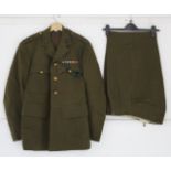 Three British military soldier’s dress jackets; & various other items of British military clothing