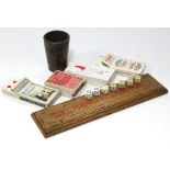 A “Purnells Red Stamp Fine Shag” a wooden cribbage board; three sets of playing cards; & a leather