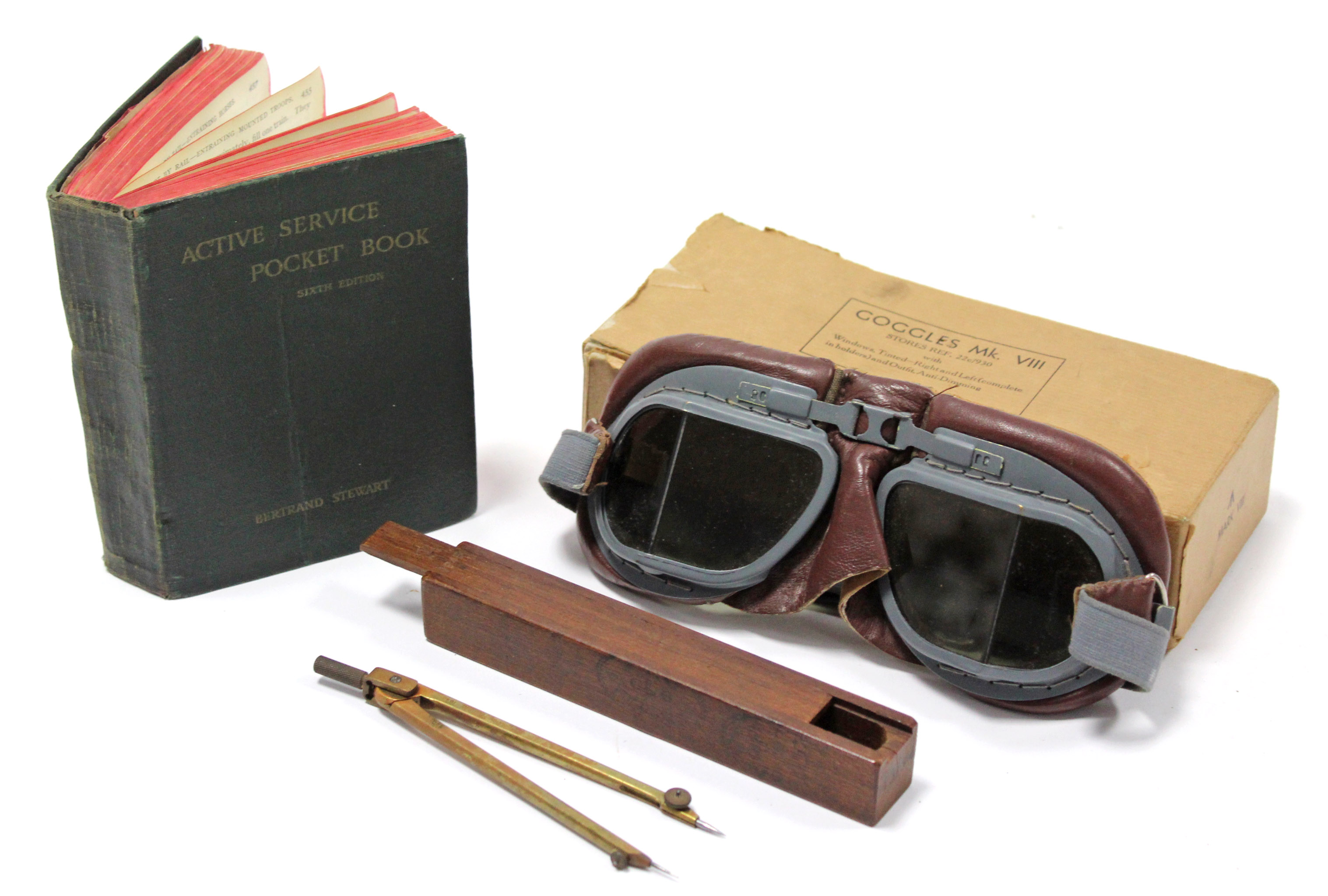 A pair of WWII aircraft pilot's goggles (MK VIII), boxed; together with a WWII drawing compass in