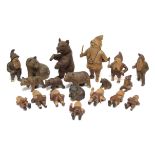 A collection of nineteen various Black Forest carved wooden models, comprising seven bears, & twelve