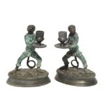 A pair of bronzed novelty monkey character candlesticks, each inscribed to base “FRATIN”, 8” high.