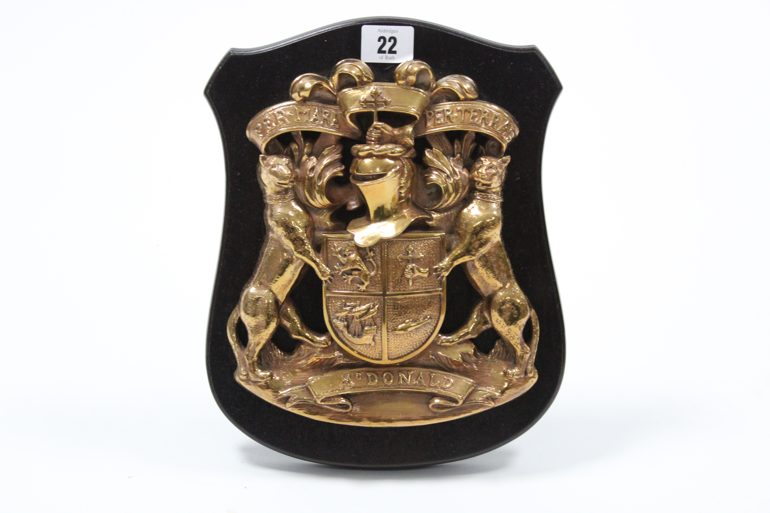 A John Macnicol & Sons heraldic bronzed coat of arm “Mcdonald”, 11” high, with certificate.