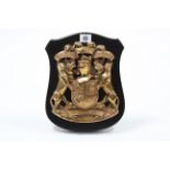 A John Macnicol & Sons heraldic bronzed coat of arm “Mcdonald”, 11” high, with certificate.