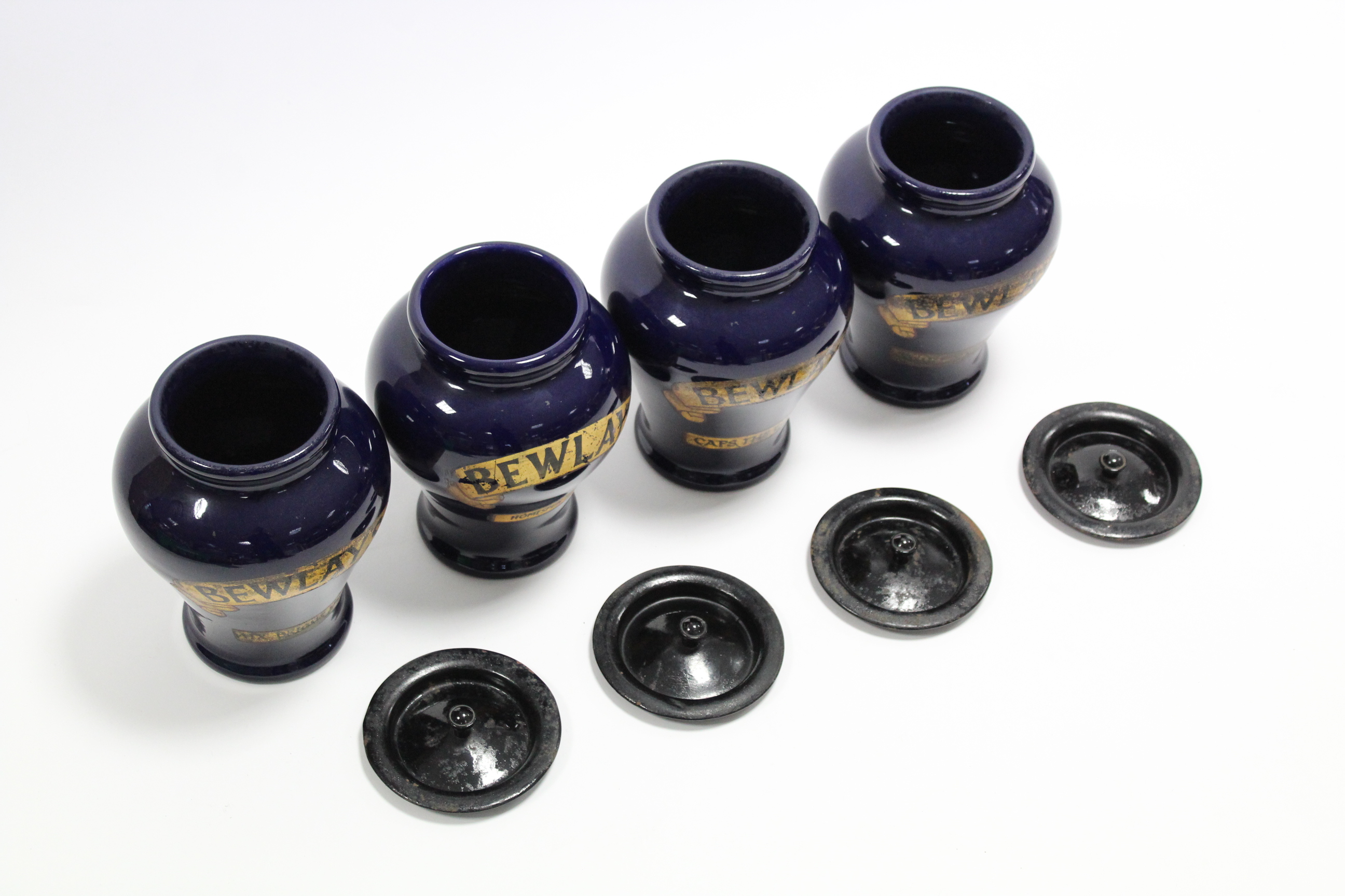 A set of four early 20th century Royal Doulton blue glazed stoneware “BEWLAYS” tobacco jars, 8½” - Image 3 of 3