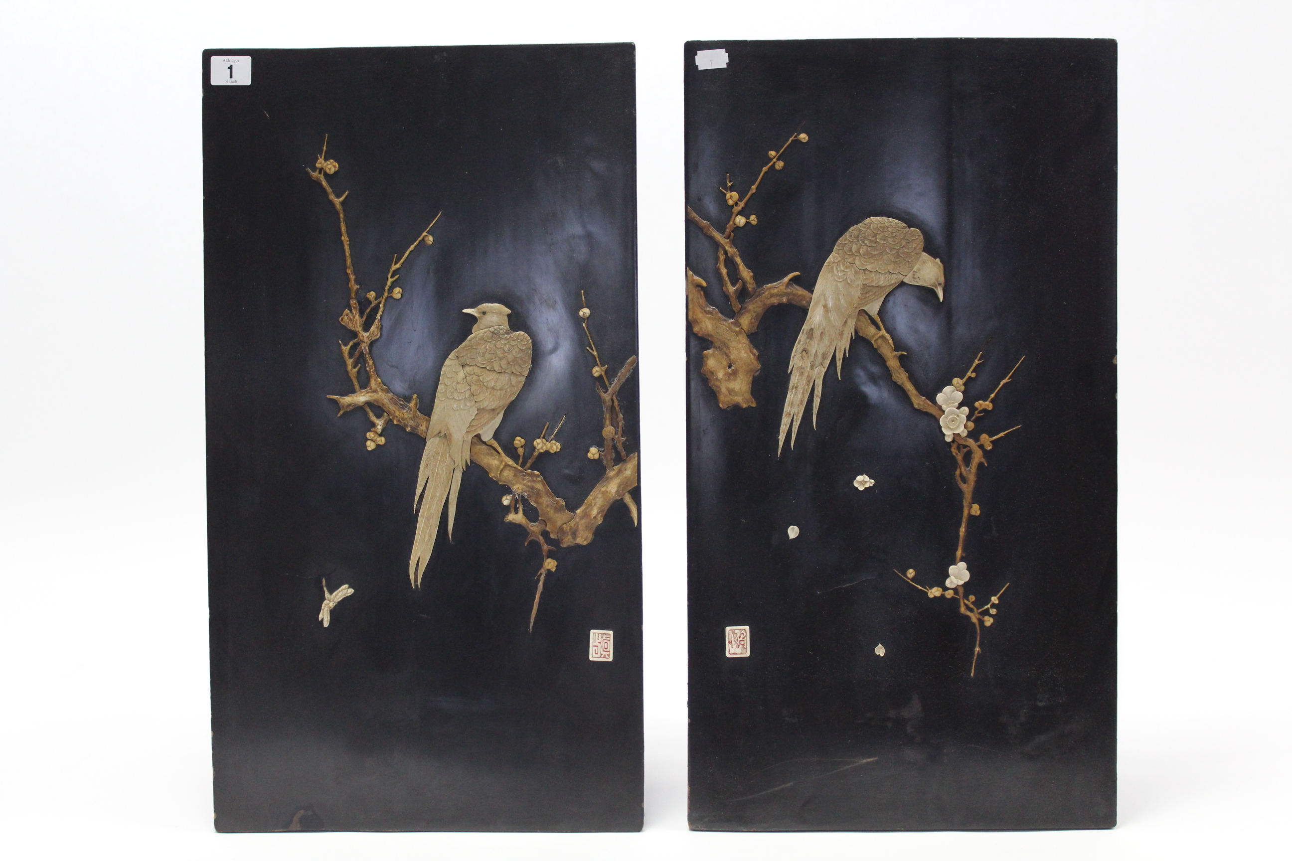 A pair of Japanese black lacquered rectangular panels each with bone overlaid bird decoration, 24” x