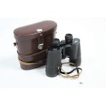 A pair of Carl Zeiss Jena Dekarem 10 x 50mm binoculars with leather case.