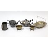 A silver plated oval three-piece tea service; a plated circular teapot; a plated cake baster; & a