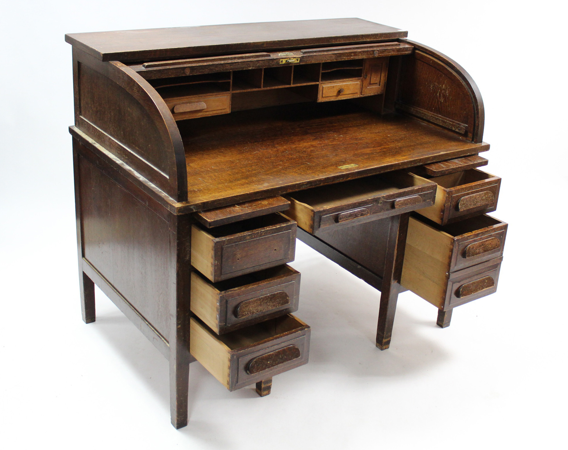 An early 20th century oak roll-top desk with fitted interior enclosed by tambour shutter, fitted - Image 3 of 5