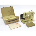 A Bernina “Minimatic” electric sewing machine, with case, w.o.