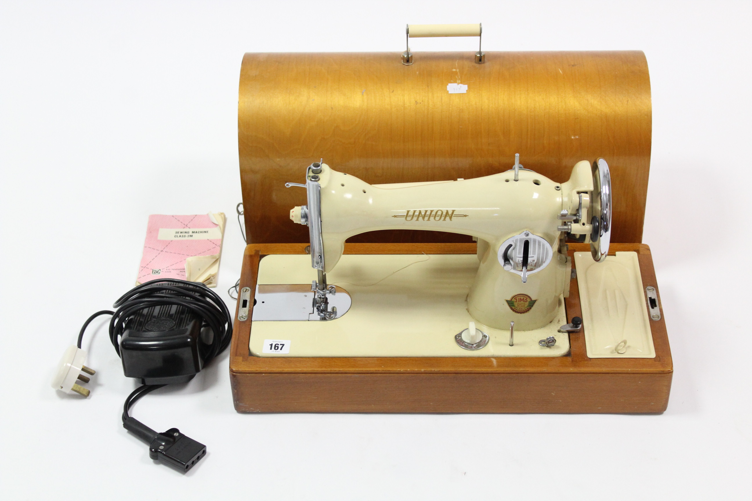 A Union electric sewing machine with carrying case, w.o.