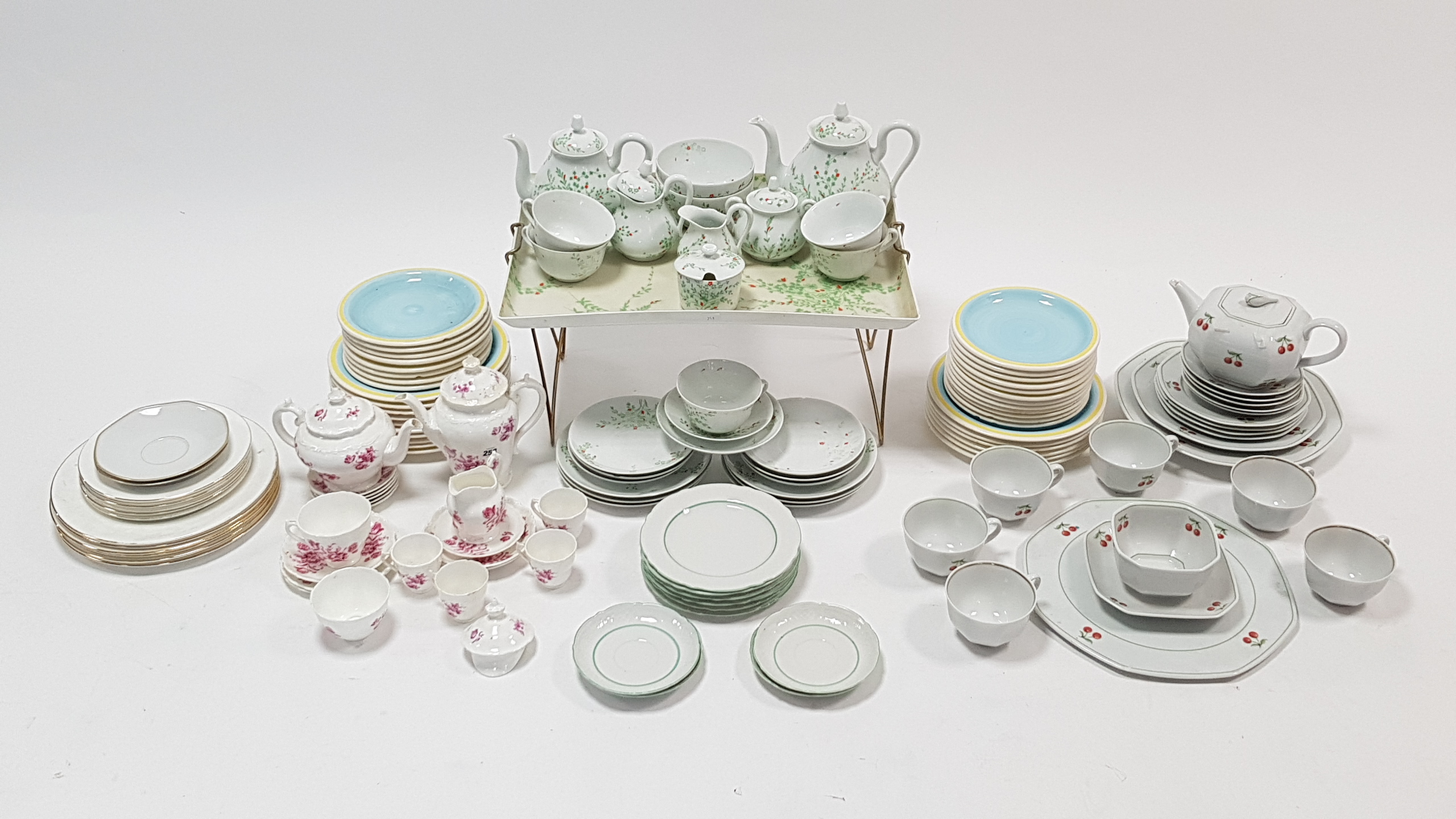 Twenty items of Coalport bone china “Divinity Pink” pattern tea & coffee ware; a Limoges nineteen