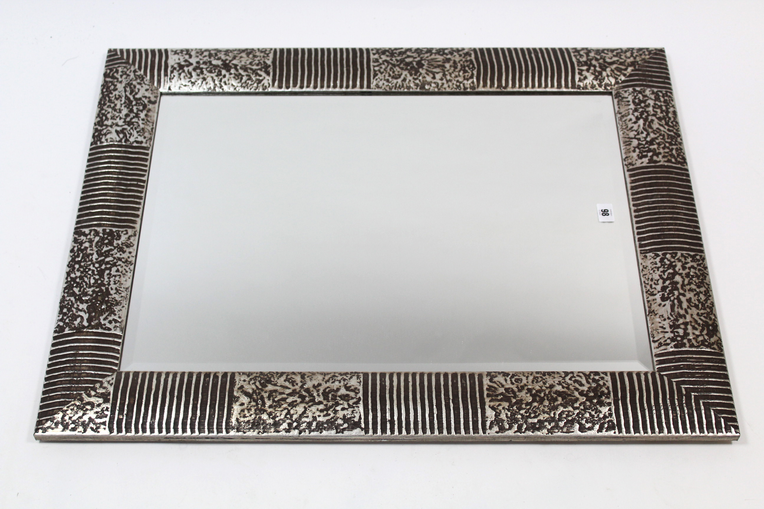 A large rectangular wall mirror in silvered-finish frame & inset bevelled plate, 34½” x 26½”; & a