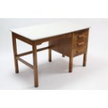 A white painted & natural oak knee-hole office desk the right-hand side fitted brushing slide
