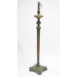 An oriental style Chinoiserie standard lamp of green ground & with multi coloured figure scene