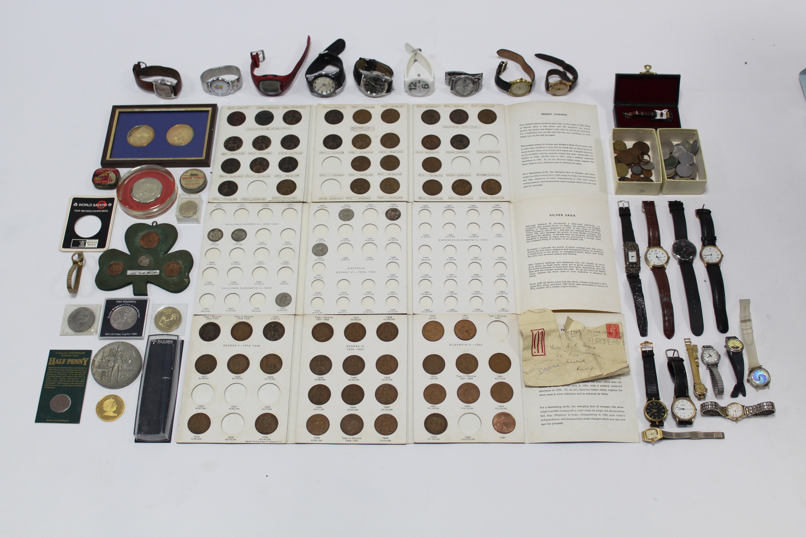 Twenty two various ladies’ & gents wristwatches; together with various coins, etc.