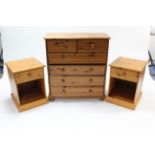 A pine serpentine-front chest fitted two short & four long drawers with turned knob handles; & on