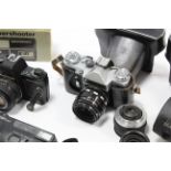 A Zenit TTL camera; a Zenit-E camera; a Praktica BMS camera; two other cameras; & various camera