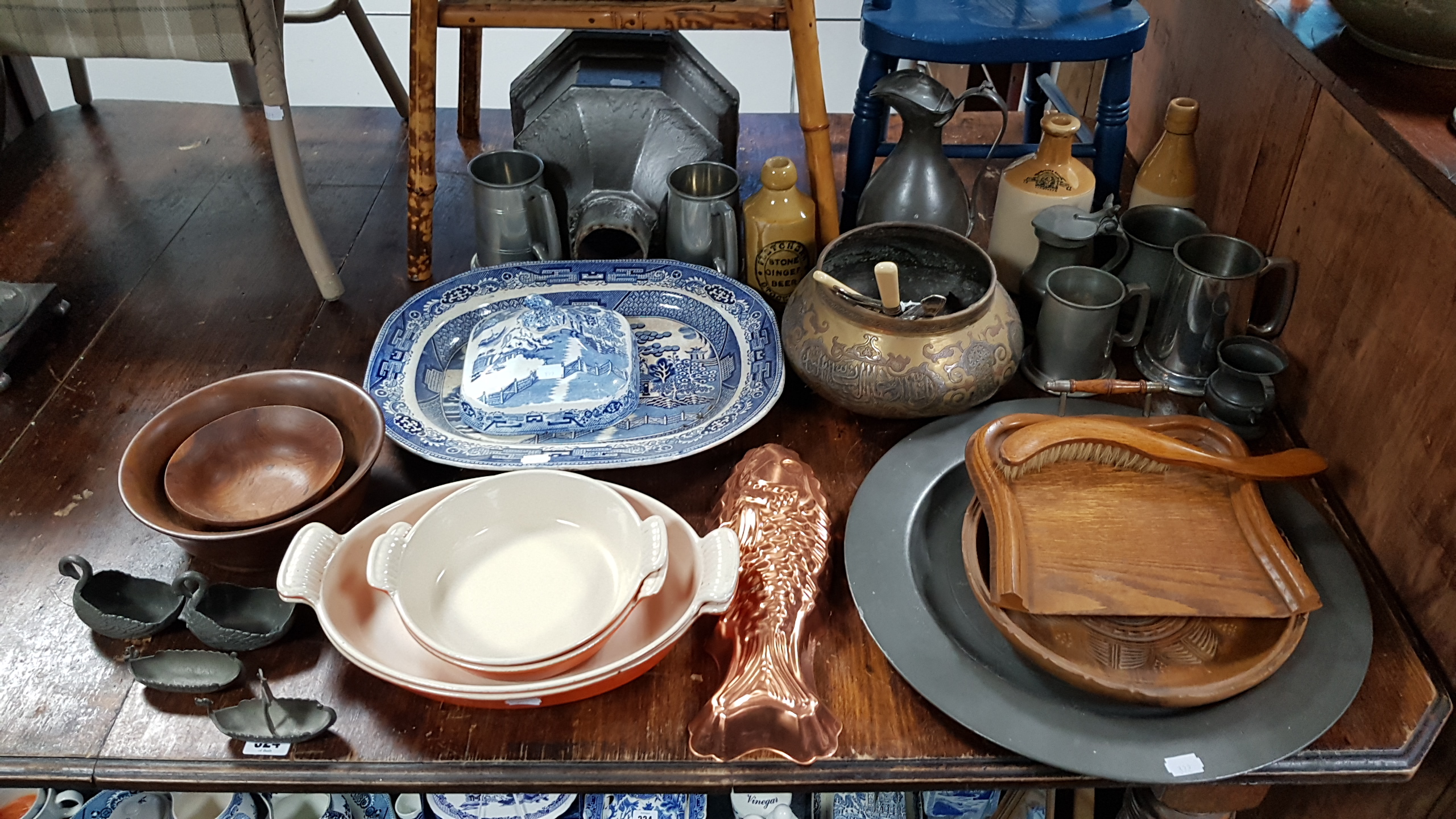 A copper helmet-shaped coal scuttle; an oak crumb tray & brush; three stoneware bottles; & sundry