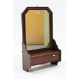 A late Victorian mahogany rectangular bathroom wall mirror hinged compartment below & with shaped