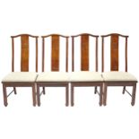 A set of six American hardwood dining chairs each with carved geometric design to the tall panel