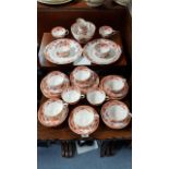 A Victorian china thirty-six piece part tea service with oriental village scene decoration.