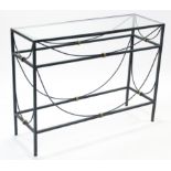 A green wrought-iron side table on square supports & with plate-glass top, 47” long; & a green-