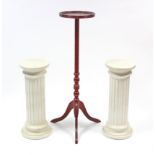 A pair of white painted round fluted pedestals, 9” diameter x 24” high, & a reproduction mahogany