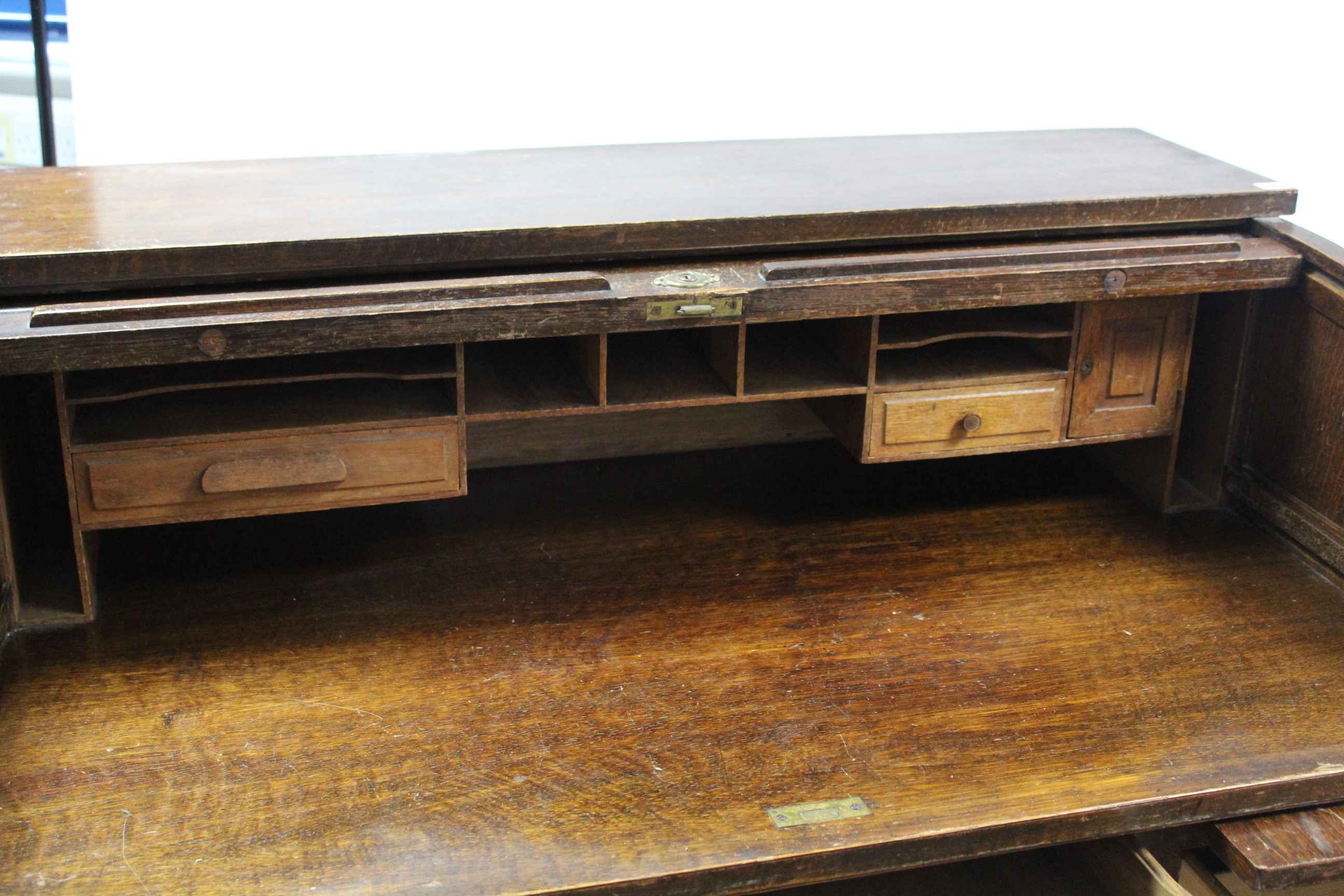 An early 20th century oak roll-top desk with fitted interior enclosed by tambour shutter, fitted - Image 5 of 5