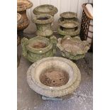 Ten various reconstituted-stone garden flower pots (part w.a.f.); together with a matched set of