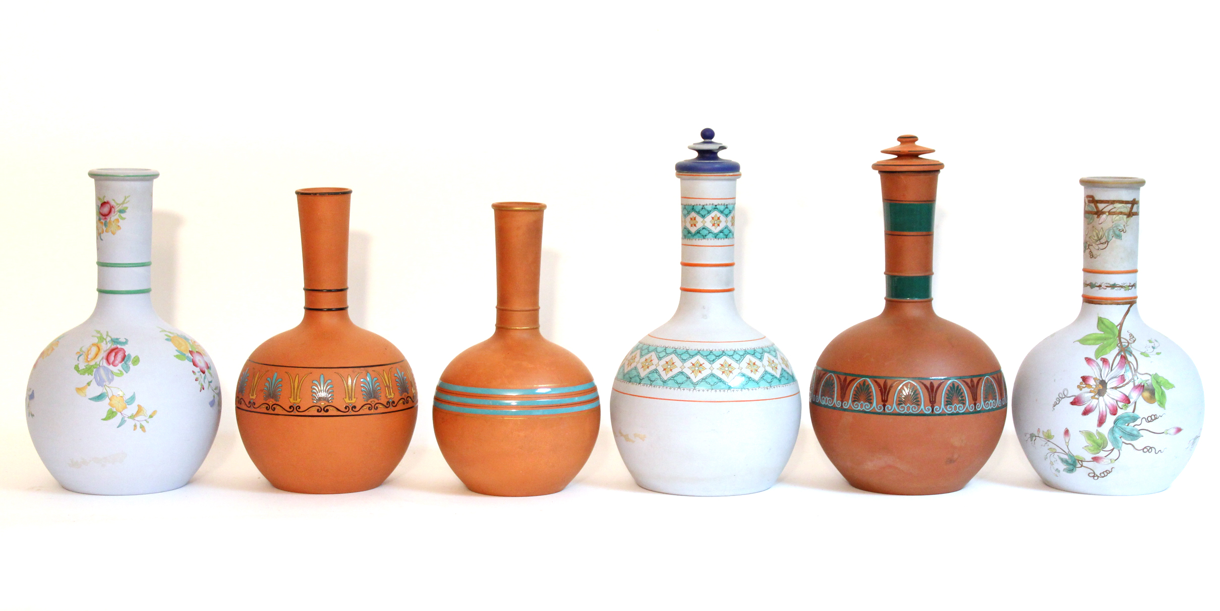 Six various terracotta bottle vases with floral & classical decoration, w.a.f.