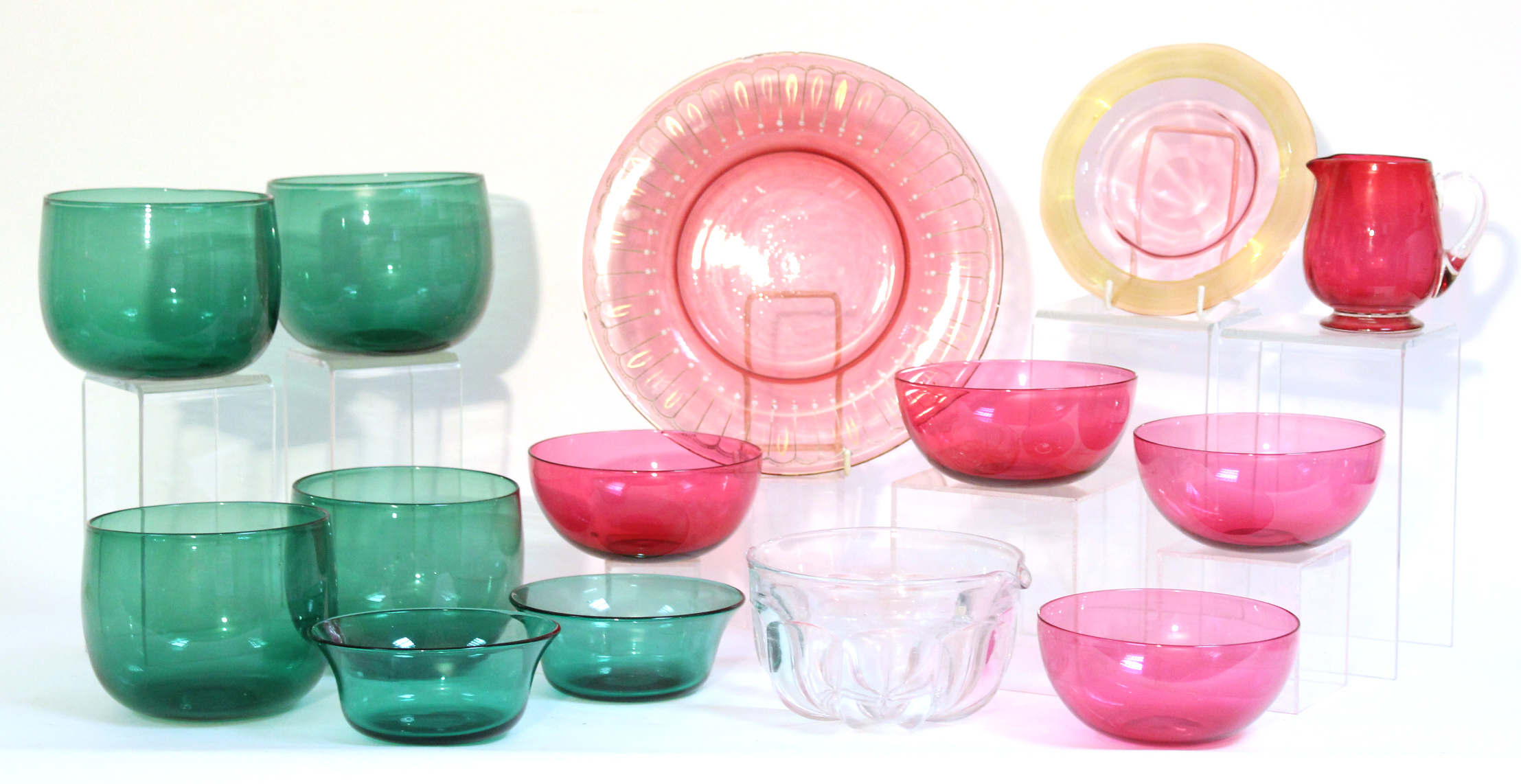 Seven various items of cranberry glassware comprising four 5” bowls, a 9¼” dish (rim chips), a 6¼”