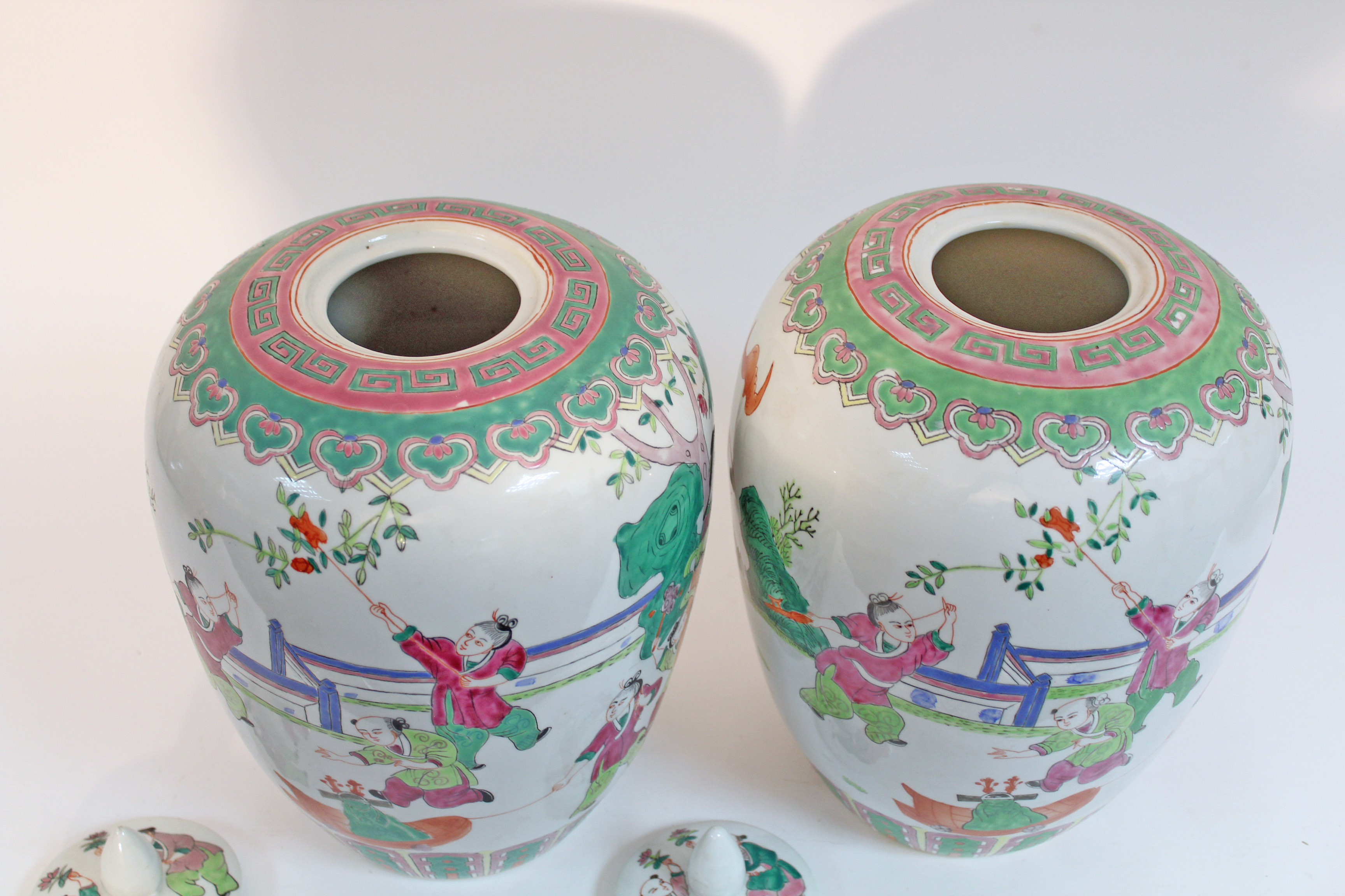 A pair of Chinese porcelain large ovoid vases & covers, decorated in famille verte enamels with - Image 9 of 10
