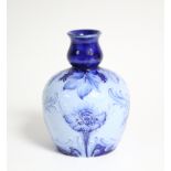A James Macintyre & Co. ‘Florian Ware’ small ovoid vase designed by William Moorcroft with blue