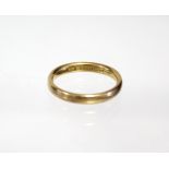 A 22ct. gold wedding band; Birmingham hallmarks for 1922. (6.2gm).