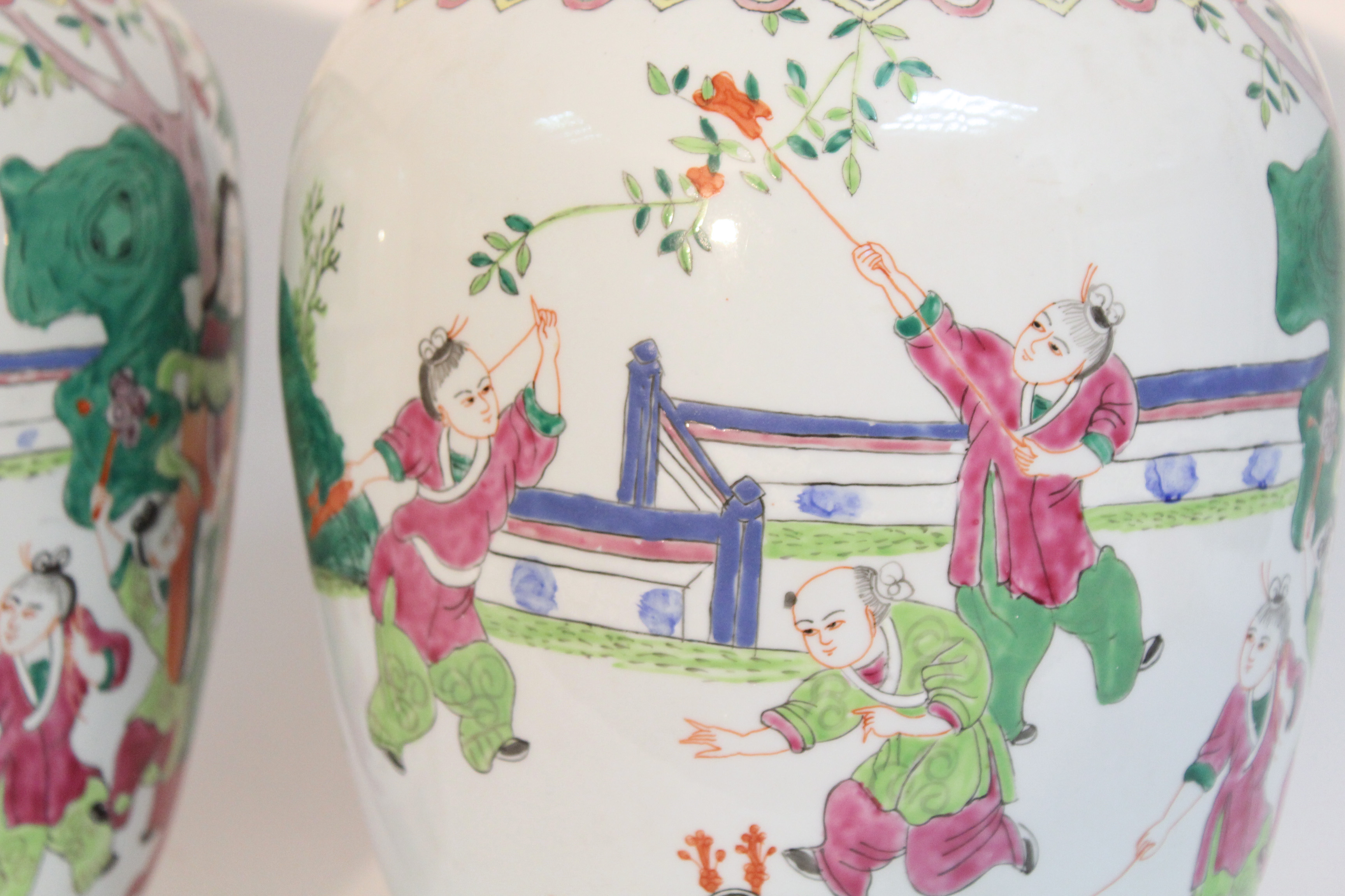 A pair of Chinese porcelain large ovoid vases & covers, decorated in famille verte enamels with - Image 5 of 10