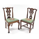 Two 19th century mahogany Chippendale-style dining chairs, with pierced splat backs & padded drop-in