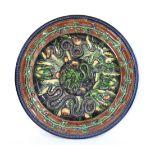 A French Palissy-type majolica charger, with relief decoration of various creatures, seashells, &