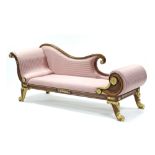 A REGENCY-STYLE MAHOGANY & PARCEL-GILT CHAISE LONGUE, with scroll ends & carved foliate