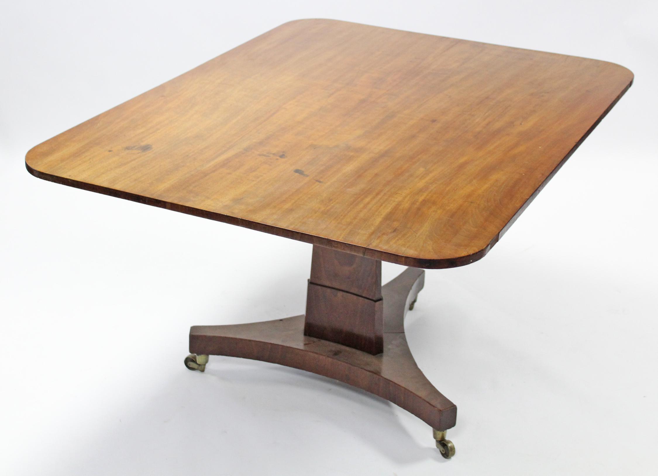 A 19th century mahogany breakfast table with plain rectangular tilt-top, on triform base with - Image 2 of 4