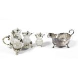 A Victorian cruet set by S. Smith, Covent Garden, fitted four thistle-shaped cut-glass condiments on