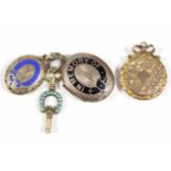 Three late 19th/early 20th century engraved gilt-metal pendant lockets, two with enamel