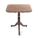 A 19th century mahogany tripod table, the rectangular tilt-top with rounded corners & on ring-turned