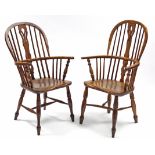 A matched pair of 19th century ash & elm Windsor elbow chairs, with pierced splats to the hooped