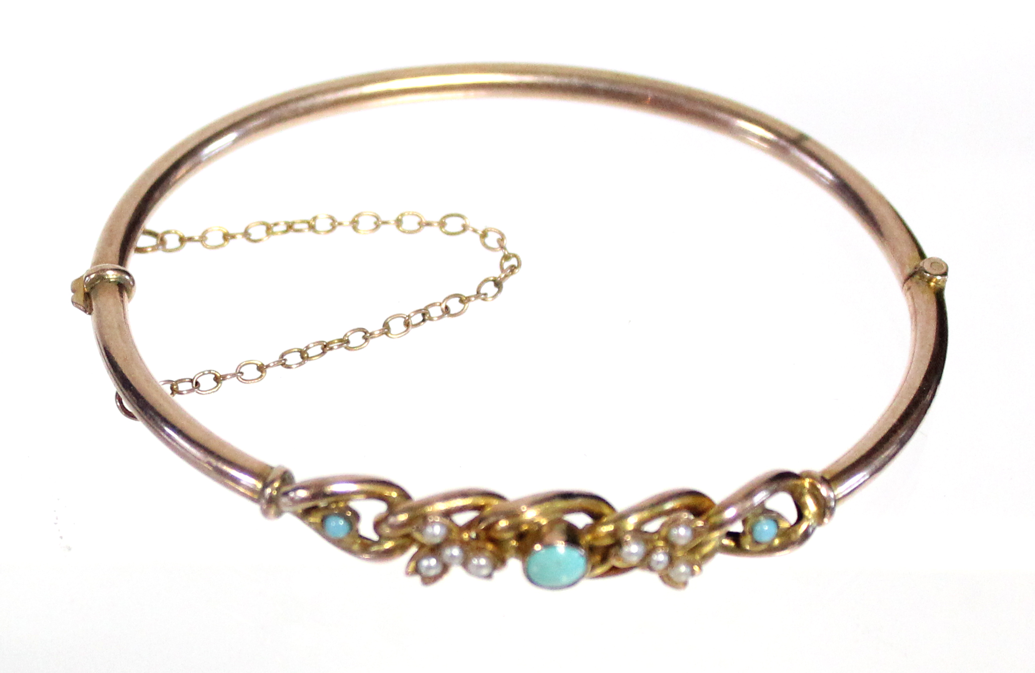 A 9ct. gold stiff hinged hollow bangle set turquoise beads & seed pearls. (5.6gm gross). - Image 2 of 3