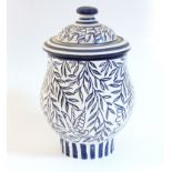 A Van der Straeten pottery blue & white baluster jar & cover, decorated with birds amongst