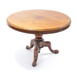 A mid-Victorian mahogany loo table, the circular tilt-top with moulded edge, on turned centre column